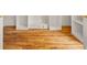 Walk-in closet with hardwood floors and custom built-in shelving for storage at 6771 Sunny Brook Ln, Atlanta, GA 30328