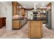 Traditional eat-in kitchen with granite counters, stainless appliances, and a kitchen island at 6771 Sunny Brook Ln, Atlanta, GA 30328