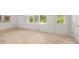 Spacious Living Room with tile floors and access to the backyard and kitchen at 6771 Sunny Brook Ln, Atlanta, GA 30328