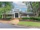 Well-maintained clubhouse with manicured landscaping and ample parking at 85 Dunwoody Springs Dr, Sandy Springs, GA 30328