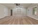 Bonus room with a ceiling fan, and a built-in shelving unit at 100 Percheron Dr, Canton, GA 30114