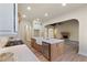 Farmhouse kitchen with a large island, stainless steel appliances, and an open-concept design at 100 Percheron Dr, Canton, GA 30114