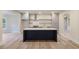 Spacious kitchen with gray cabinets, stainless appliances, white countertops, and large island at 100 Percheron Dr, Canton, GA 30114