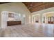 Spacious living room with vaulted wood ceiling, gourmet kitchen and double door entry at 100 Percheron Dr, Canton, GA 30114
