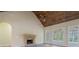Spacious living room with vaulted wood ceiling and elegant stone fireplace at 100 Percheron Dr, Canton, GA 30114