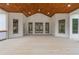Rear porch boasts recessed lighting, wood ceiling, and view of the backyard at 100 Percheron Dr, Canton, GA 30114