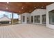 Back porch boasts stained wood ceiling, screened-in railing, and a beautiful view at 100 Percheron Dr, Canton, GA 30114