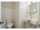 Stylish powder room with board and batten wall, modern sink, and gold hardware at 100 Percheron Dr, Canton, GA 30114