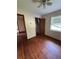 Modest bedroom with hardwood floors, closet, and natural light at 6380 Mableton Sw Pkwy, Mableton, GA 30126