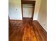 Closet showcasing hardwood flooring and an area ready to be organized for optimal storage at 6380 Mableton Sw Pkwy, Mableton, GA 30126