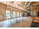 Unfinished basement with a ping pong table and large windows for natural light at 1765 Pinetree Pass Lane Southwest Sw Ln, Lilburn, GA 30047