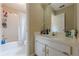 Bathroom with white vanity, shower, and lots of storage at 1765 Pinetree Pass Lane Southwest Sw Ln, Lilburn, GA 30047