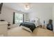 Bedroom with a ceiling fan and window overlooking the backyard at 1765 Pinetree Pass Lane Southwest Sw Ln, Lilburn, GA 30047