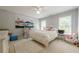 Cozy bedroom with a window, desk, and lots of room to play at 1765 Pinetree Pass Lane Southwest Sw Ln, Lilburn, GA 30047