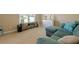 Cozy living room featuring a comfortable sectional sofa and neutral decor at 1765 Pinetree Pass Lane Southwest Sw Ln, Lilburn, GA 30047