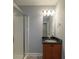 Bathroom featuring a glass enclosed shower and a sink at 2264 Ewell Park Dr, Lawrenceville, GA 30043