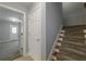 Hallway with stairs and a door leading to another room at 2264 Ewell Park Dr, Lawrenceville, GA 30043