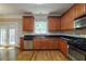 Stylish kitchen with stainless steel appliances, and ample cabinet space at 2264 Ewell Park Dr, Lawrenceville, GA 30043