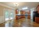 Bright kitchen featuring wood cabinets, modern appliances, and an inviting eating area at 2264 Ewell Park Dr, Lawrenceville, GA 30043