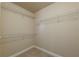 A walk-in closet with white wire shelving on the walls at 2264 Ewell Park Dr, Lawrenceville, GA 30043