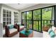 Relaxing balcony with comfortable seating and a view of lush greenery, ideal for outdoor enjoyment at 23307 Plantation Ne Dr, Atlanta, GA 30324