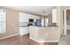 Kitchen featuring white cabinets, black countertops, and stainless steel appliances at 795 Lake Medlock Dr, Alpharetta, GA 30022
