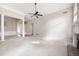 Large living room featuring carpeted floors, white trim, and a fireplace at 795 Lake Medlock Dr, Alpharetta, GA 30022
