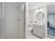 Neutral toned bathroom featuring a tiled shower, new fixtures and a modern sink at 2900 Townley Cir, Atlanta, GA 30340