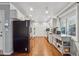 Efficient galley kitchen featuring stainless steel appliances and ample cabinet space at 2900 Townley Cir, Atlanta, GA 30340