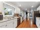 Modern kitchen with stainless steel appliances, granite counters, and hardwood floors at 2900 Townley Cir, Atlanta, GA 30340