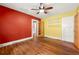 Spacious bedroom featuring hardwood floors, neutral paint, and a ceiling fan at 3956 Tell Sw Rd, Atlanta, GA 30331