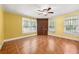 Bedroom with tile flooring, natural light from multiple windows, and closet at 3956 Tell Sw Rd, Atlanta, GA 30331
