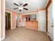 Open living area with tile floors, neutral walls, and easy access to the kitchen and other rooms at 3956 Tell Sw Rd, Atlanta, GA 30331