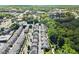 An aerial view of a residential neighborhood with tree-lined streets and sidewalks at 420 Banbury Xing, Alpharetta, GA 30009