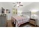 Charming bedroom with ceiling fan, plantation shutters, and cozy furnishings at 420 Banbury Xing, Alpharetta, GA 30009