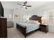 Bedroom featuring a large bed, shuttered windows, and crown molding at 420 Banbury Xing, Alpharetta, GA 30009