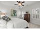 Bright bedroom with white walls, shutters, ceiling fan, and elegant décor at 420 Banbury Xing, Alpharetta, GA 30009