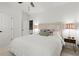 Bedroom featuring plush bedding, crown molding, bedside tables with lamps at 420 Banbury Xing, Alpharetta, GA 30009