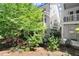 Beautiful two-story home with manicured landscaping and charming white siding at 420 Banbury Xing, Alpharetta, GA 30009