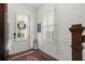 Bright foyer featuring beautiful trim, wooden floors, and natural light at 420 Banbury Xing, Alpharetta, GA 30009