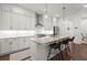 Open kitchen featuring granite countertops, a central island with bar seating, and modern appliances at 420 Banbury Xing, Alpharetta, GA 30009