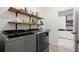 Laundry room featuring modern washer and dryer plus shelving at 420 Banbury Xing, Alpharetta, GA 30009