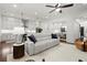 Open-concept living room and kitchen with stylish decor and modern appliances at 420 Banbury Xing, Alpharetta, GA 30009
