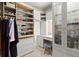 Well-organized closet with shelves, drawers, and vanity area at 420 Banbury Xing, Alpharetta, GA 30009