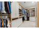 Spacious walk-in closet with custom shelving and ample storage space at 420 Banbury Xing, Alpharetta, GA 30009