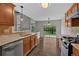 Kitchen area with stainless steel dishwasher, sink, granite countertops, and a view of the backyard at 535 Watercress Dr, Woodstock, GA 30188