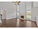 Spacious living room with tall ceilings, modern fireplace, and large windows for lots of natural light at 535 Watercress Dr, Woodstock, GA 30188