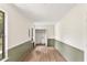 Bedroom with wainscoting, large window, and natural light at 5759 Albans Way, Lithonia, GA 30058