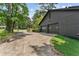 Attached two-car garage with plenty of parking space and convenient access, surrounded by mature trees at 5759 Albans Way, Lithonia, GA 30058