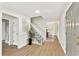 Entry hallway leading to dining room and stairs to upper level at 5759 Albans Way, Lithonia, GA 30058